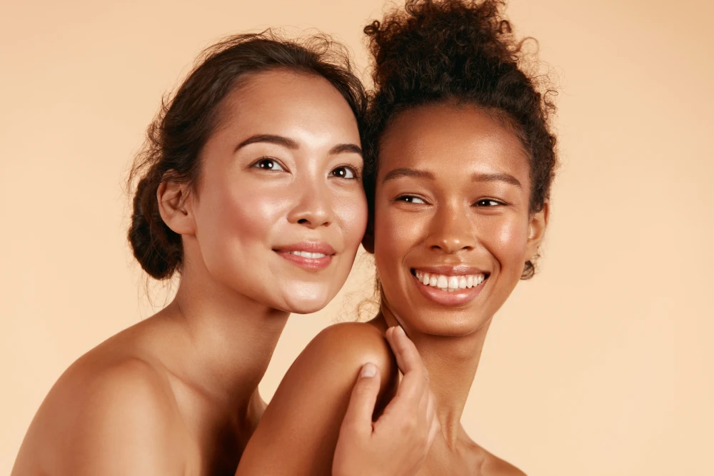 Two women with radiant skin after Botox treatment.