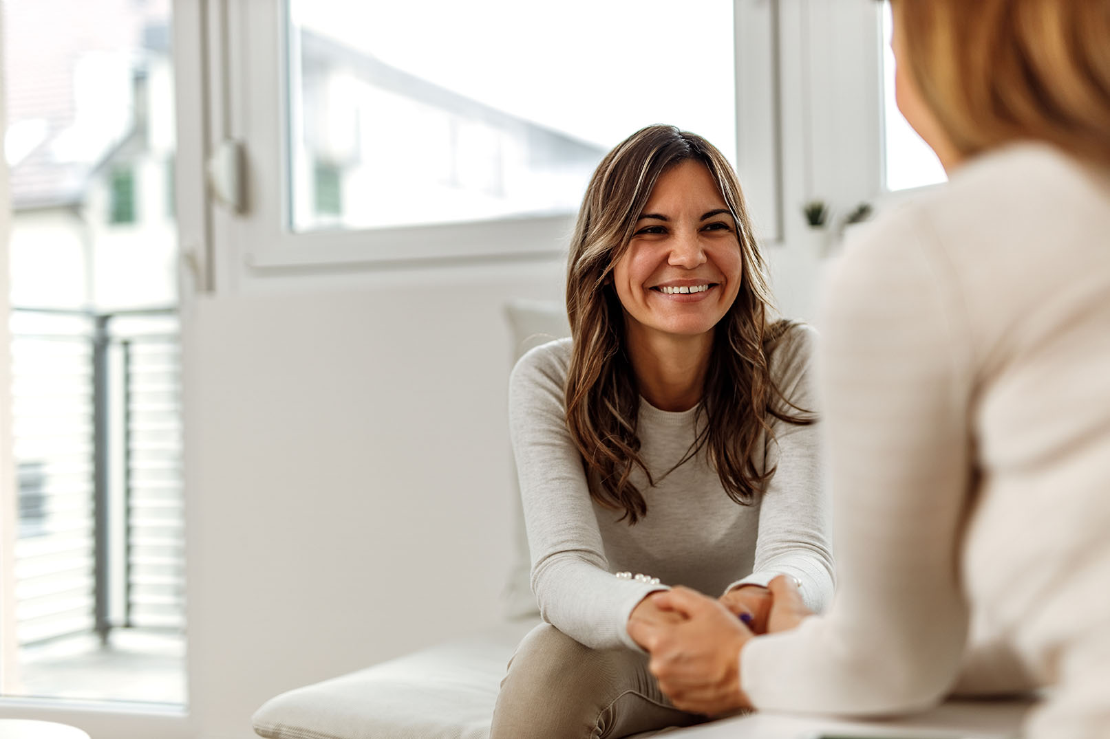 Woman helping patient to survive depression.