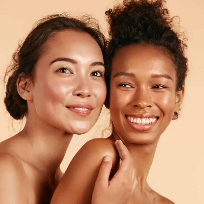 Two women with radiant skin after Botox treatment.